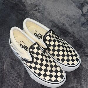 Vans Black and White Checkerboard Slip-Ons